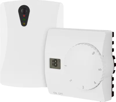 Two white electronic devices, likely a thermostat and a receiver, are shown against a white background.