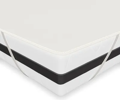 A close-up view of a mattress protector on a mattress.