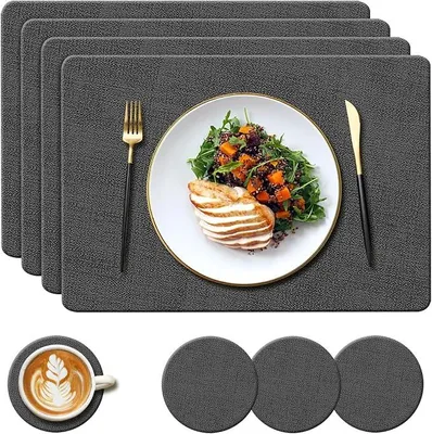 Produktbild von PolkaHome® Set aus 4 Kunstleder-Tischsets und 4 runden Untersetzern, hitzebeständig bis 100 °C, rutschfest, wasserdicht, dunkelgrau, 43