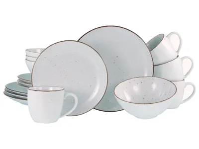 A collection of white ceramic dishes and mugs with a speckled pattern and brown trim, arranged on a white background.