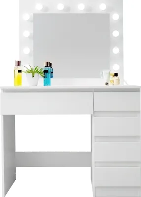 A white vanity table with a mirror and LED lights, decorated with a few cosmetic bottles and a small plant.