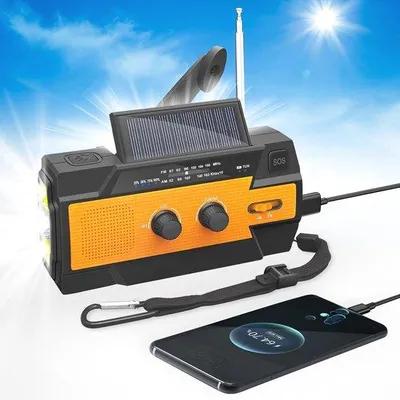 Zdjęcie produktu dla Przenośne radio solarne z akumulatorem o pojemności 4000 mAh – radio z dynamem, obsługujące pasma AM/FM, z funkcją ładowania przez USB, latarką LED i alarmem SOS, idealne na kemping