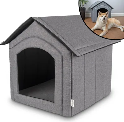 A gray fabric dog house with an arched entrance.