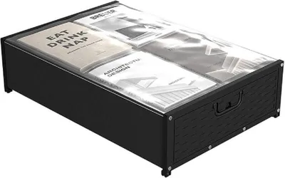 A black under-bed storage box with a clear lid, containing several magazines or books.