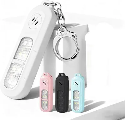 Produktbild von Oplaadbare 130 dB Sicherheits-Sirene mit Stroboskop und LED-Taschenlampe, Frauenalarm, Schlüsselanhänger, Nachtsicherheit, Kinder-Notsirene, weiß