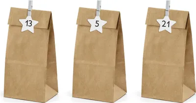Three brown paper bags with star-shaped tags clipped to the top, each displaying a number.