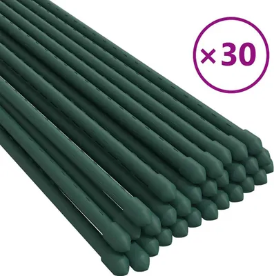 A pile of green plant stakes.