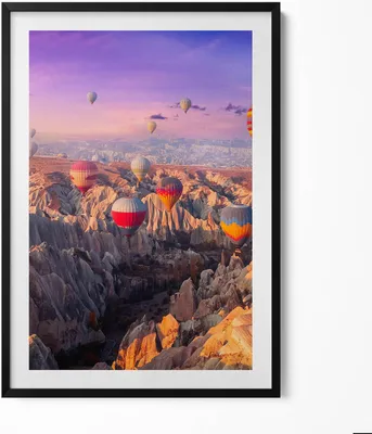 Produktbild von Ballons fliegen über eine Schlucht– Wandbild mit Rahmen – Gerahmtes Bild  – Wanddekoration – 70x100 cm –  Schwarz Rahmen
