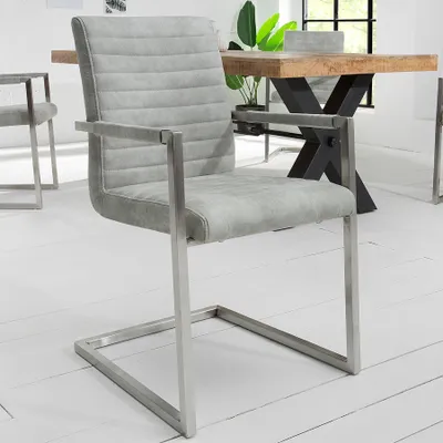 Produktbild von riess-ambiente Industrial Freischwinger Stuhl LOFT stone grau mit Armlehne Edelstahlgestell Esszimmerstuhl Essstuhl Stuhl