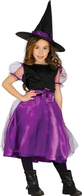 A young girl wearing a witch costume.