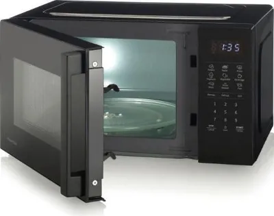 A black Hisense microwave with the door open, showing the interior and a glass turntable.