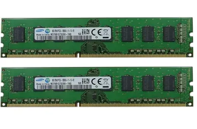 Two green RAM modules are shown against a white background.