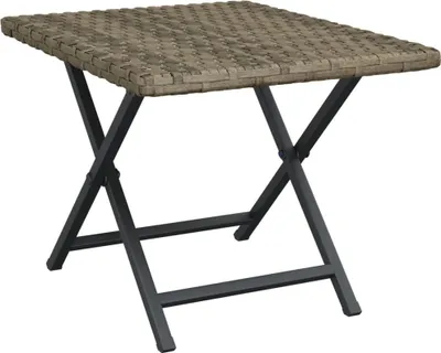 A folding table with a woven top and metal legs, isolated on a white background.