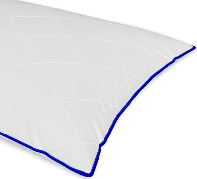 A close-up view of a white pillow with a blue trim.