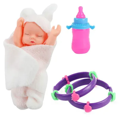 Produktbild von Kinderpuppe mit Zubehör im Ei - ca. 13 cm