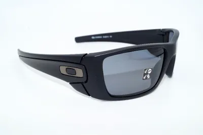 Product shot of Oakley sunglasses on a white background.