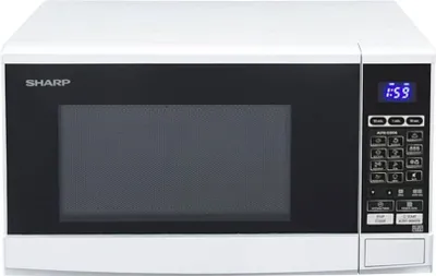 A white Sharp microwave oven is shown from the front.