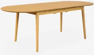 An oval wooden dining table with four legs, shown against a white background.