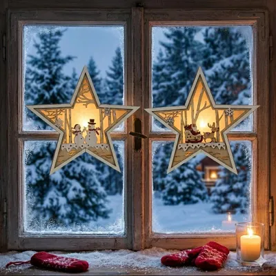 Immagine prodotto di Stella a LED con Babbo Natale e renne - magia natalizia come un arco di candele