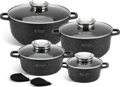 A set of four black pots with glass lids and silver handles, arranged on a white background. Two black pot holders are in the foreground.