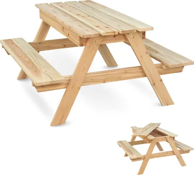 A wooden picnic table with attached benches, shown from a slightly elevated side angle. A second, smaller image of the table folded is in the bottom right corner.