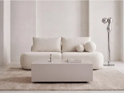 Produktbild von Couchtisch 90 x 55 cm in Kaschmir – Niedriger Mobiler Sofatisch mit Versteckten Rollen, Minimalistisches Design in Klarer Blockform – EU