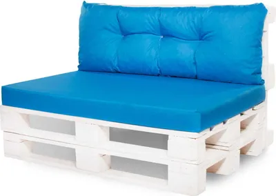 A blue cushion set on a white wooden pallet sofa.