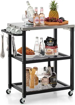A three-tier rolling kitchen cart filled with various food and drink items.