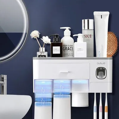 Produktbild von Unyqoos® Wand-Zahnbürstenhalter mit automatischem Zahnpastenspender – 6 Steckplätze, 3 magnetische Becher, Aufbewahrungsfach, bohrfreie Montage, BPA-frei