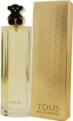 A perfume bottle and its packaging are displayed against a white background.