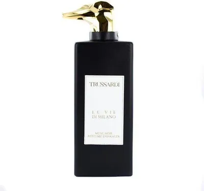 A black bottle of perfume with a gold cap shaped like a dog's head.
