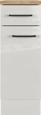 A white kitchen cabinet with a wooden top and black handles.