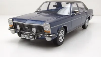 Produktbild von MCG 1:18 Opel Diplomat B - metallic-darkblue/matt-black - 1972