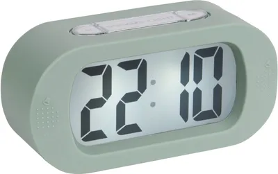 A digital alarm clock with a green casing and a digital display showing the time.