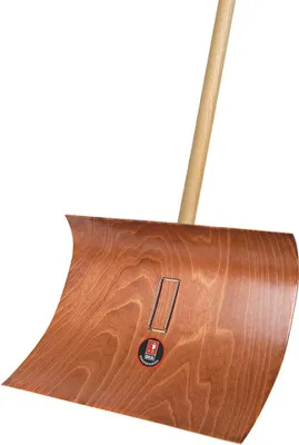 A close-up view of a wooden snow shovel head with a handle.