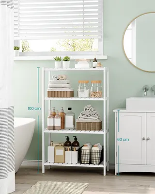 A white shelving unit filled with toiletries and towels in a bathroom.
