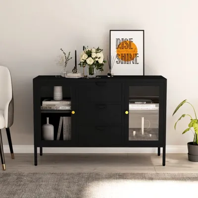 A black sideboard with drawers and a glass-fronted cabinet, decorated with a framed picture and flowers on top, placed in a room setting.