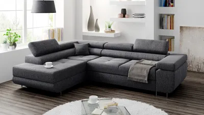 A modern living room with a large sectional sofa.