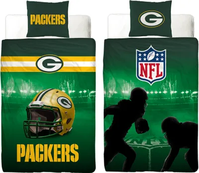 Two sides of a Green Bay Packers themed duvet cover and pillow set, displayed on beds.