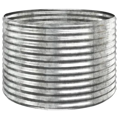 A silver corrugated metal raised garden bed.