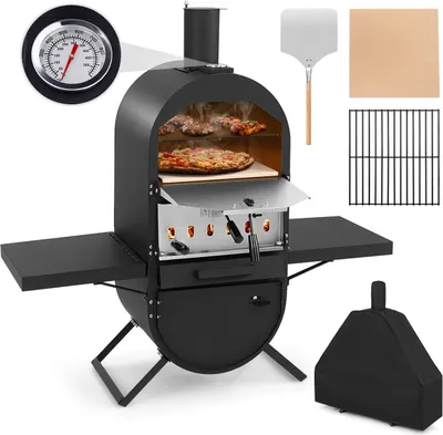 A black outdoor pizza oven with accessories, displayed on a white background.
