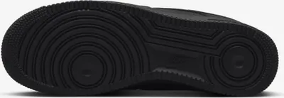 The sole of a black Nike Air Force 1 shoe is shown against a white background.