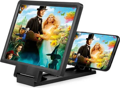 A smartphone screen magnifier with a stand, displaying a movie scene.