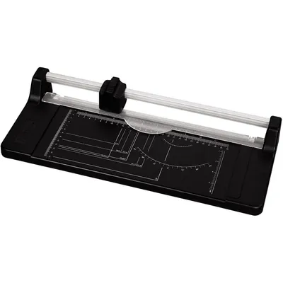 A black paper trimmer with silver metal accents and markings for measurements.