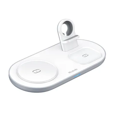A white wireless charging station with multiple charging pads and a stand for a smartwatch.