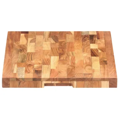 A wooden chopping board with a mosaic pattern of wood blocks.