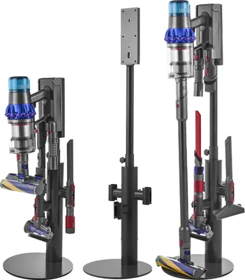 Three different Dyson vacuum cleaner stands are displayed against a white background.