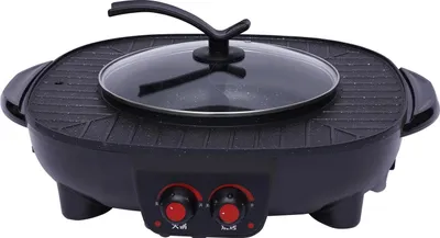 A black electric grill and hot pot combination with a glass lid and two red control knobs on a white background.