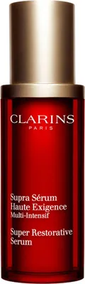 A product shot of a Clarins serum bottle.