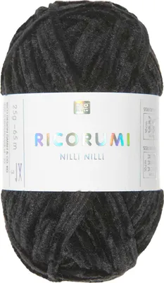 A ball of dark gray yarn with a white label wrapped around it.
